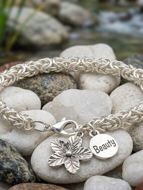 Sterling Silver Bracelet with Floral Charm